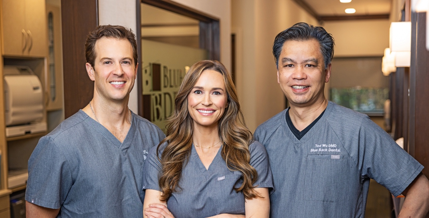 Three smiling cosmetic dentists in West Hartford and Avon