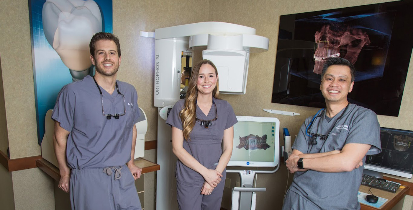 Three smiling dentists at Blue Back Dental in West Hartford and Avon