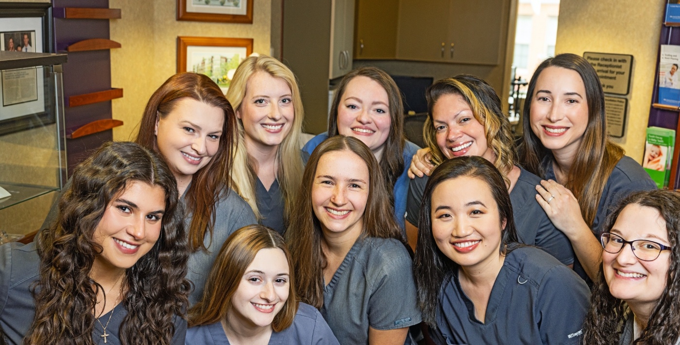 Smiling group of dental team members at Blue Back Dental