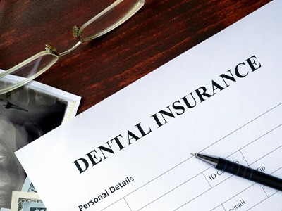 Close up of dental insurance form sitting on a desk